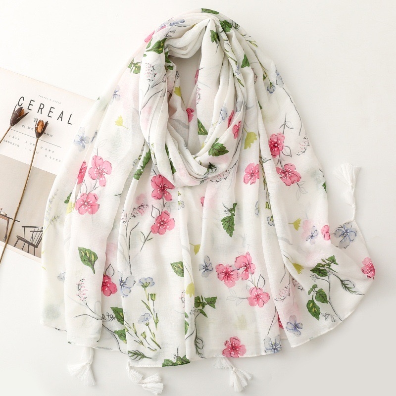 Foulard imprimé fleurs avec pompons blanc