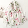Foulard imprimé fleurs avec pompons blanc
