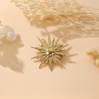 Broche soleil dorée