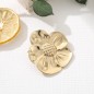 Broche fleur dorée