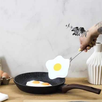 SPATULE EN FORME D'OEUF AU PLAT